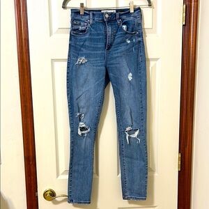 Garage Distressed Blue Jeans.    Excellent Condition